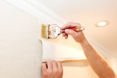 Pose de papier peint à la Tuilière — revêtements muraux et toiles de verre